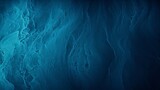 Abstract blue and black Wallpaper background. Carbon Black with a tinge of cyan blue hue. wet look. 