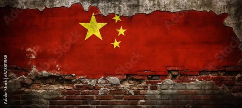 The concept of the Chinese economic crisis and recession tied to the real estate market crisis, with the China flag on a crumbling wall. photo