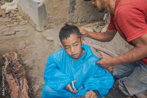 Get a traditional haircut or shave (barber shop) using manual scissors 