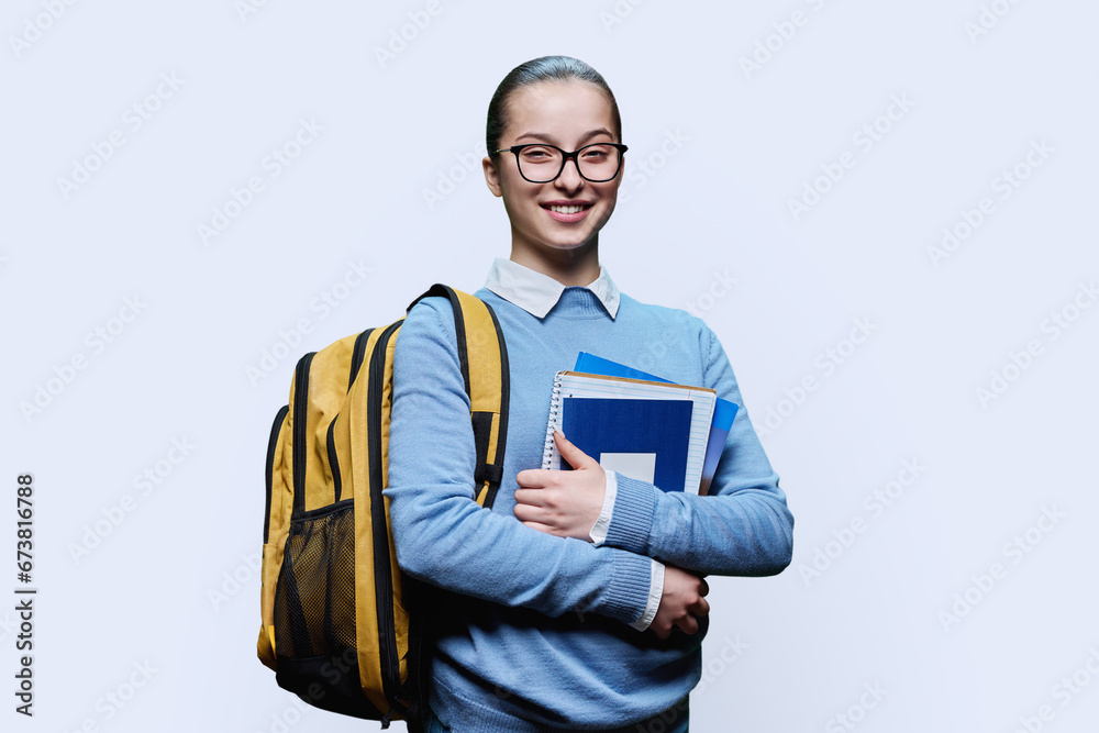 Portrait of teenage girl high school student on white background Portrait of teenage girl high school student on white background