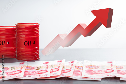 Oil barrels, yuan banknotes and red arrow up. Growth investment in the development of oil industry.