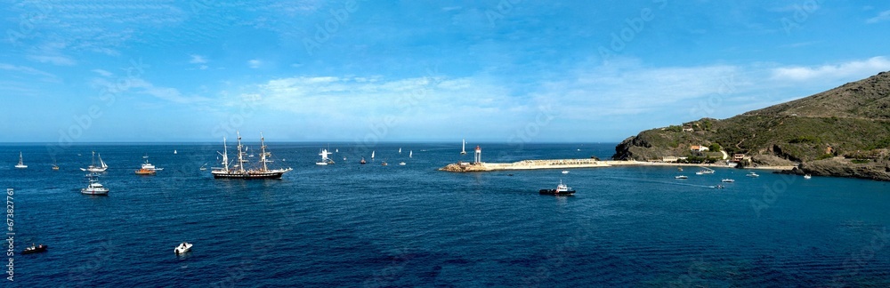 Panoramic view of boats sailing in the sea in Port-Vendres, France Panoramic view of boats sailing in the sea in Port-Vendres, France