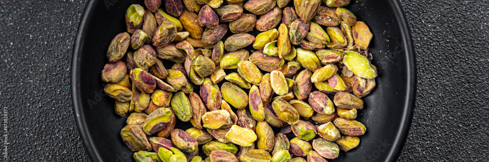 pistachios peeled without shell nut healthy eating cooking appetizer meal food snack on the table copy space food background rustic top view keto or paleo diet vegetarian vegan food pistachios peeled without shell nut healthy eating cooking appetizer meal food snack on the table copy space food background rustic top view keto or paleo diet vegetarian vegan food