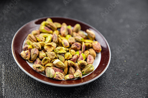 pistachios peeled without shell nut healthy eating cooking appetizer meal food snack on the table copy space food background rustic top view keto or paleo diet vegetarian vegan food