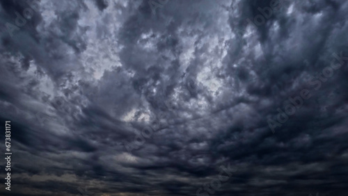 nice cloudscape of sky with heavy rain or snow clouds bg - photo of nature