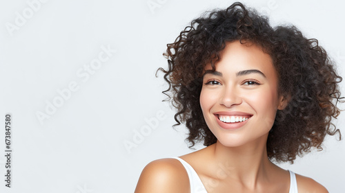 Beautiful young looking african american woman happy smiling, beauty and cosmetics advertising concept. Beauty health skincare and cosmetics advertisement commercial ad. Copy Space. 