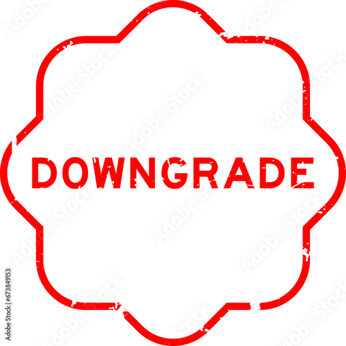 Grunge red downgrade word rubber seal stamp on white background