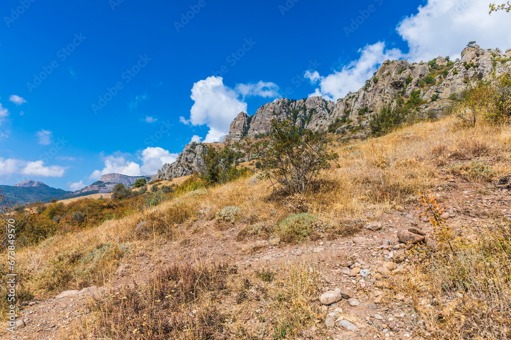 Mysterious mountain landscape of the Valley of Ghosts on the western slope of Mount Demerdzhi in Crimea. Popular tourism and trekking destination