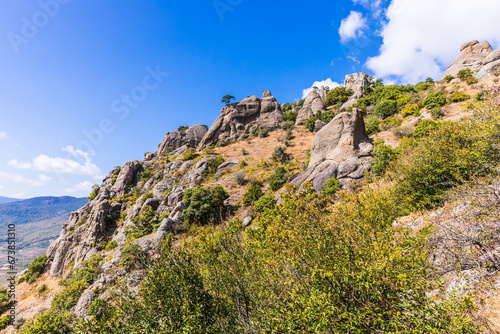 Mysterious mountain landscape of the Valley of Ghosts, a cluster of strangely shaped rocks on the western slope of Mount Demerdzhi in Crimea