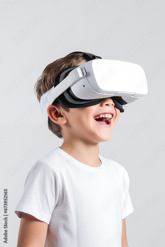 Young boy getting experience using VR headset glasses isolated on a white background Young boy getting experience using VR headset glasses isolated on a white background