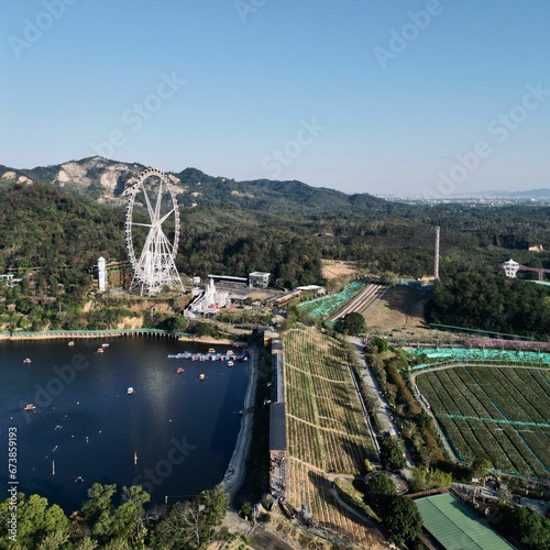 Areal view of a Ferris wheel at the waterside of Jieyang City, Guangdong Province, China photo