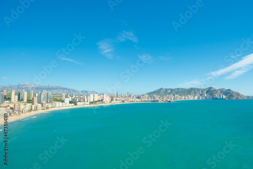 Aerial view to turquoise Mediterranean sea and Benidorm resort, Poniente beach, Alicante province, Spain © vejaa