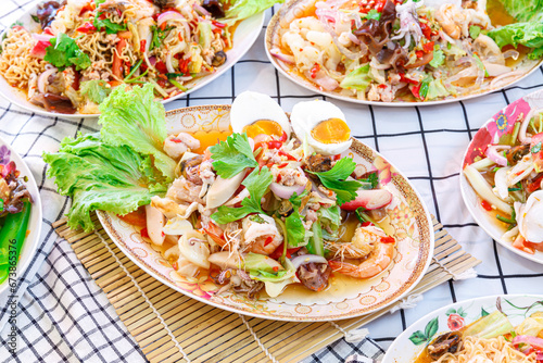 Mix Seafood salad with salted egg Thai style. Spicy salad. Thai style.