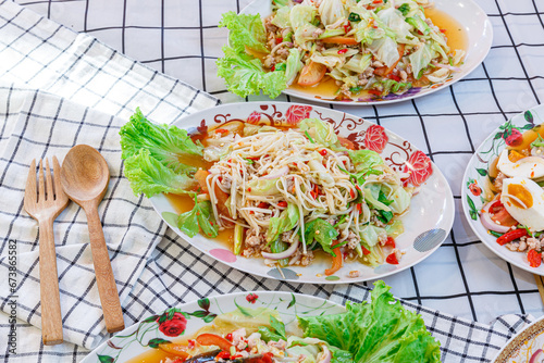 Mushrooms Spicy Salad (Golden Needles Mushrooms, Yanagi Mustutake) Cooking Northeast Food Thailand Style decorate side dish with carved vegetables photo