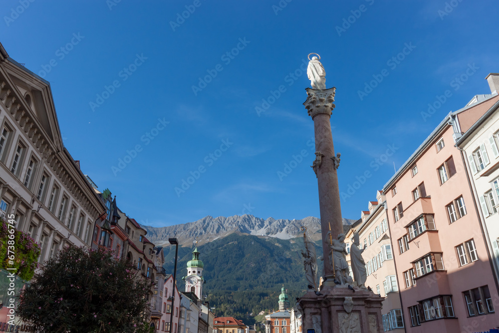 Cityscape of Innsbruck with the St. Anne's Column and Nordkette