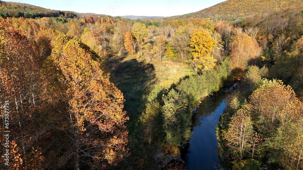 Natures beauty in landscapes in Autumn Fall colors in mountains, hills, valleys and lakeside in countryside in Pennsylvania