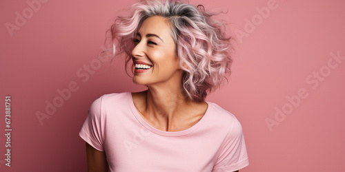 beautiful woman with colorful hair and a beautiful smile on a pink background