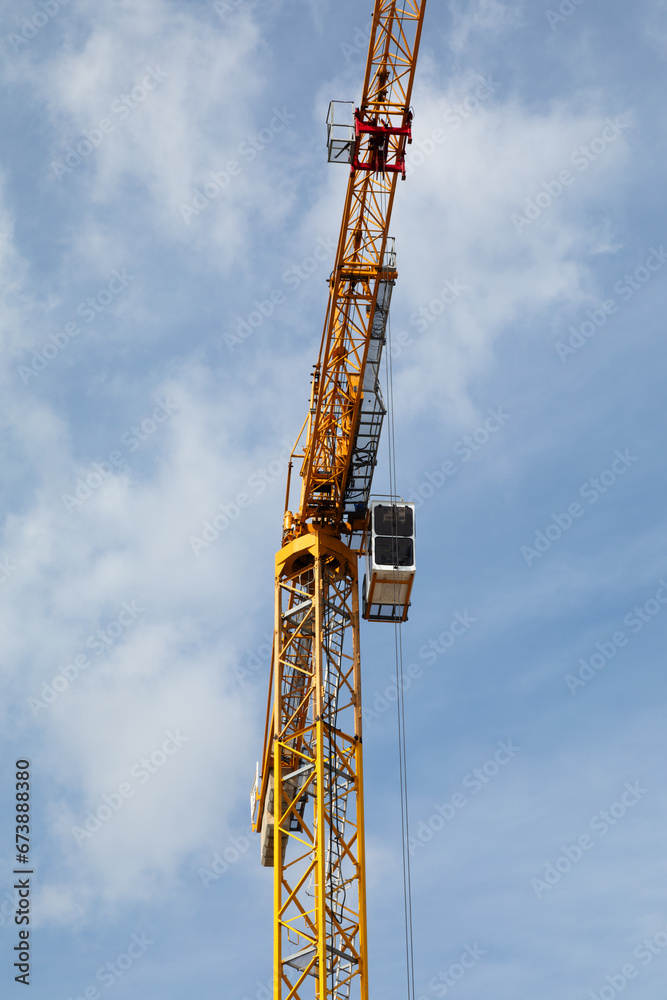 Construction crane set against sky Construction crane set against sky