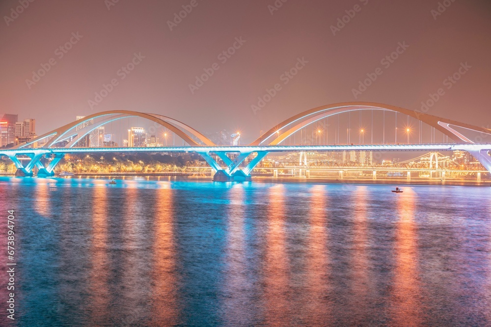 Obraz premium Night View of Guangya Bridge in Liuzhou, Guangxi Zhuang Autonomous Region, China, Asia