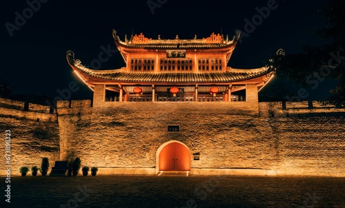 East Gate Tower of Liuzhou at night with its vibrant illumination. China.