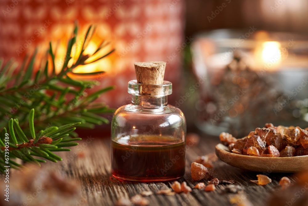 Christmas essential oil with myrrh resin and a candle Christmas essential oil with myrrh resin and a candle