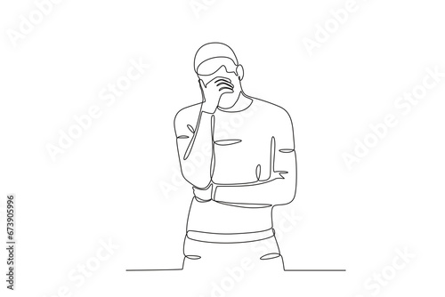 A man bowed down sadly. Blue Monday one-line drawing