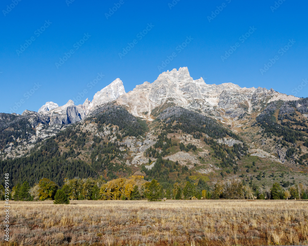 Eastern face of Teewinot Mountain in Grand Teton National Park, Wyoming during fall