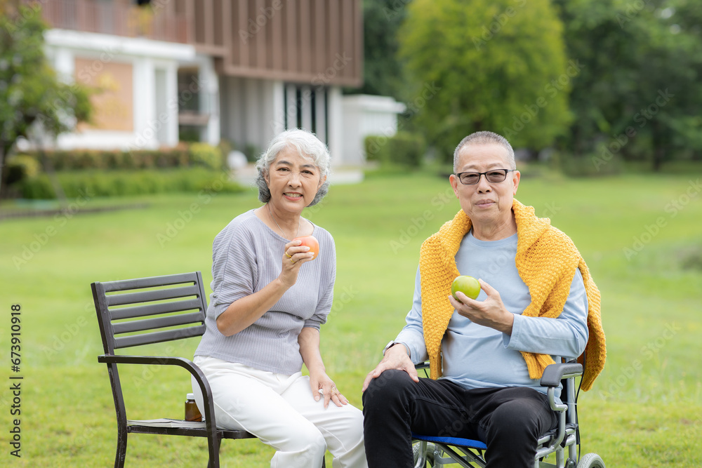 Senior couple taking care of each other in the park Senior couple taking care of each other in the park