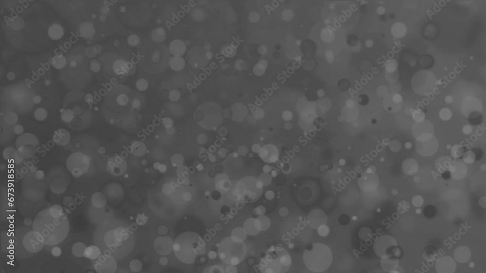 grey abstract blinking glowing glittering bokeh backdrop particles dust with moving light particles background for award , event, wedding, celebration