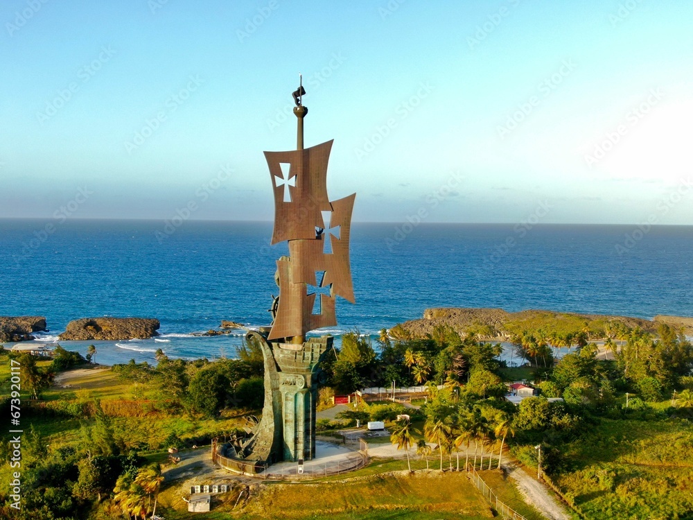 Large the Statue of Columbus statue surrounded by lush vegetation, Arecibo