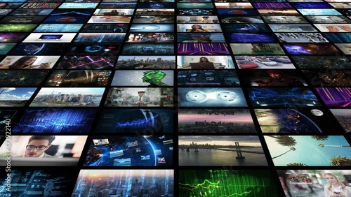 Dolly In of Several Videos and Animations Playing in Virtual World. Video Wall Screens Showing People, Futuristic Animations in The Metaverse.