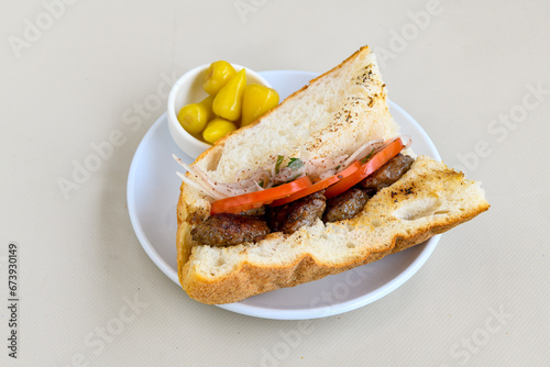 Meatball between bread (Turkish name : ekmek arasi kofte ) Izgara kofte. Manisa, Akcaabat, Akhisar  kofte photo