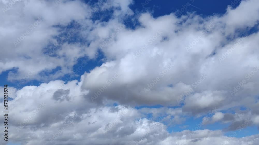 Beautiful landscape of white cumulus clouds moving in the middle of the day Beautiful landscape of white cumulus clouds moving in the middle of the day