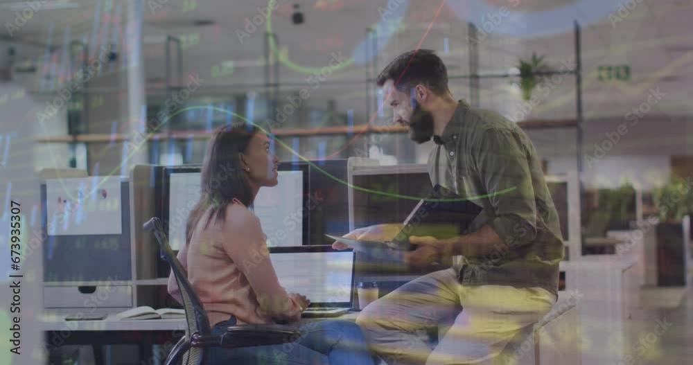 Animation of graphs, trading board and loading circles over diverse coworkers discussing on desk Animation of graphs, trading board and loading circles over diverse coworkers discussing on desk
