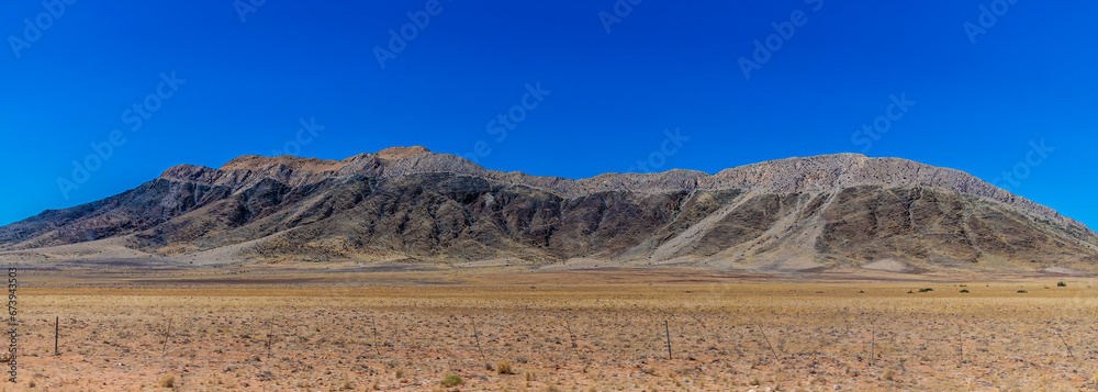 A view towards the mountain landscape in the Namib-Naukluft National Park, Namibia in the dry season