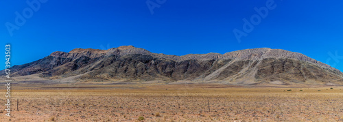 A view towards the mountain landscape in the Namib-Naukluft National Park, Namibia in the dry season