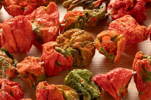 Chain of Turkish sun dried red and green peppers, Biber Kurusu,  close up  photo