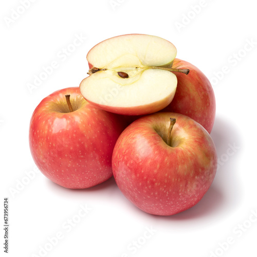 Whole and halved Pink Lady apples isolated isolated on white background