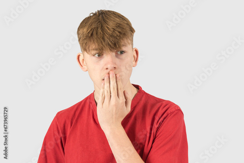 Headshot of a shocked teenage boy