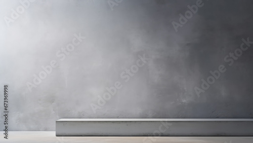 Stone podium, product placement layout in interior room with a white floor against a grey concrete wall photo