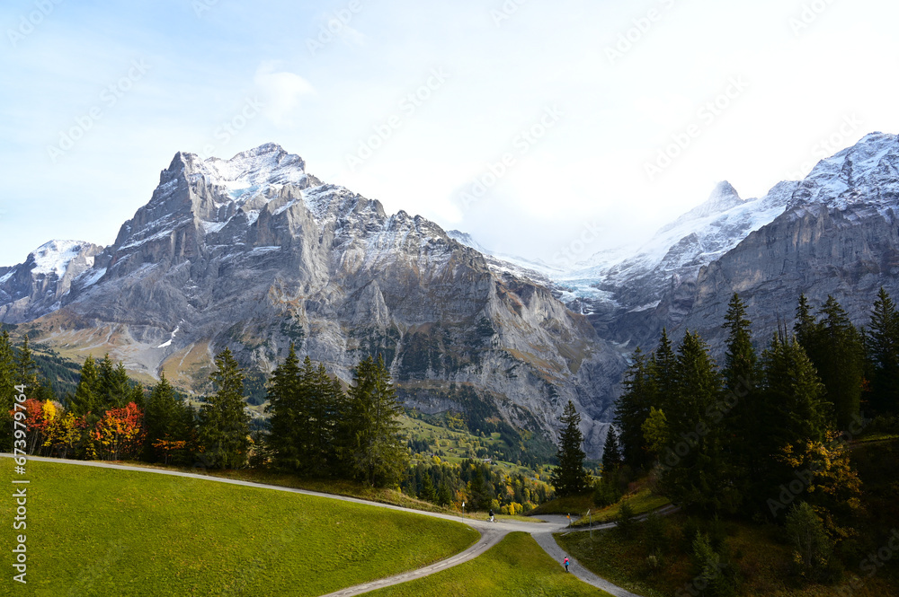 View of the Bernese Alps mountain range landscape near the Jungfrau, Grindelwald, Switzerland.