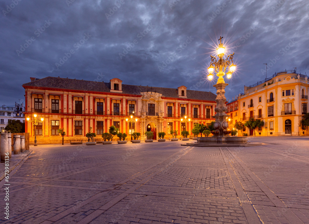 View of the Virgen de los Reyes square in Seville at sunrise.