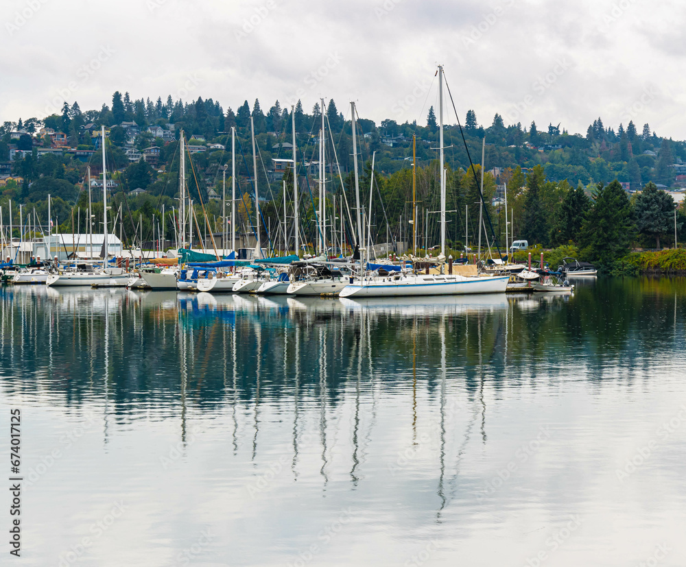 Sailboats at The Hood River Marina With The Hood River-White Salmon Bridge in The Distancer, Hood River, Oregon, USA