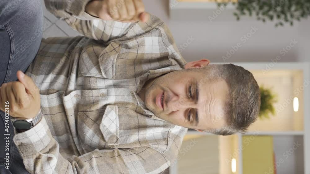 Vertical video of The unsuccessful man is frustrated. Vertical video of The unsuccessful man is frustrated.