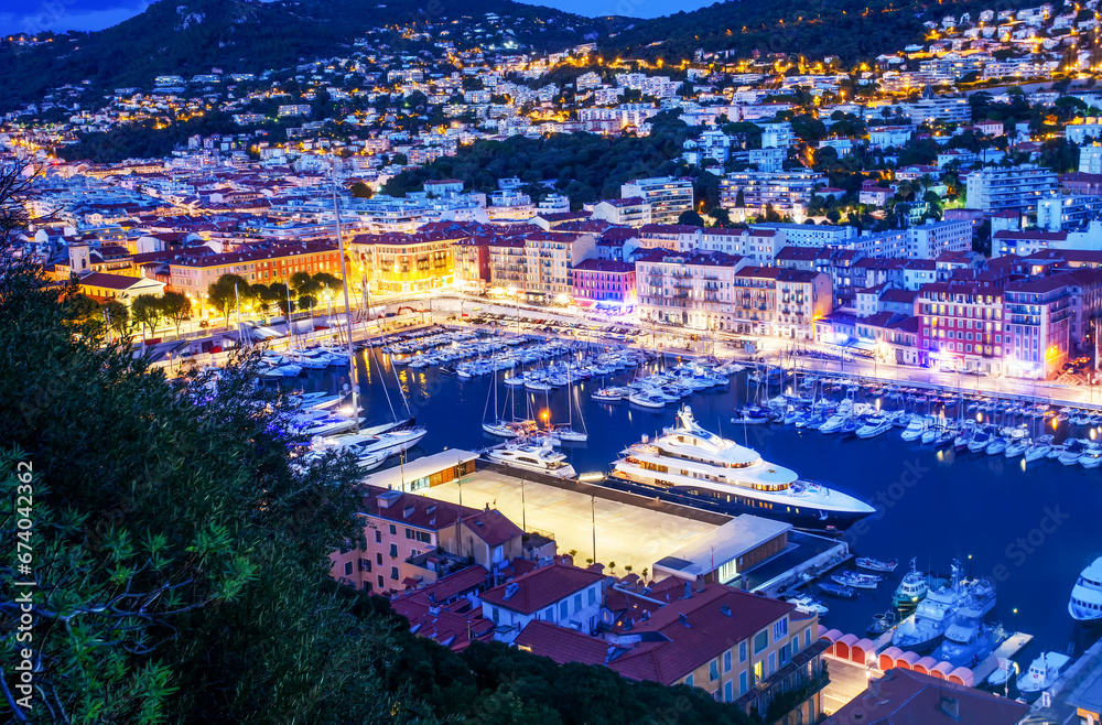 Awe Nice (French Riviera) in blue hour and illuminated port Lympia