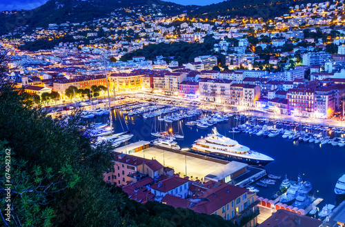 Awe Nice  French Riviera  in blue hour and illuminated port Lympia