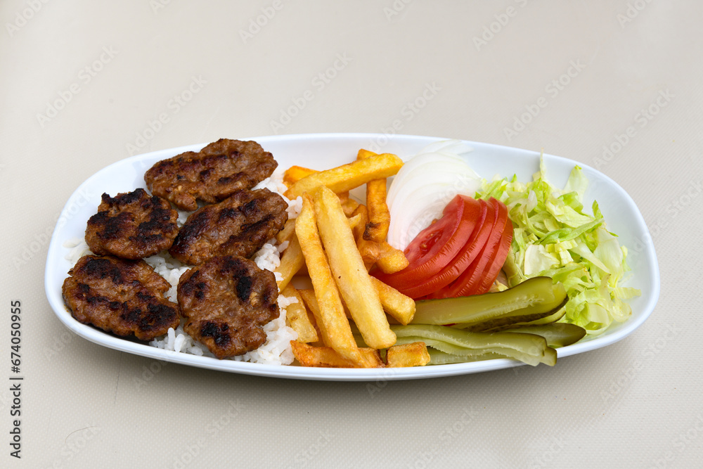 Meatball between bread (Turkish name : ekmek arasi kofte ). Izgara kofte Meatball between bread (Turkish name : ekmek arasi kofte ). Izgara kofte