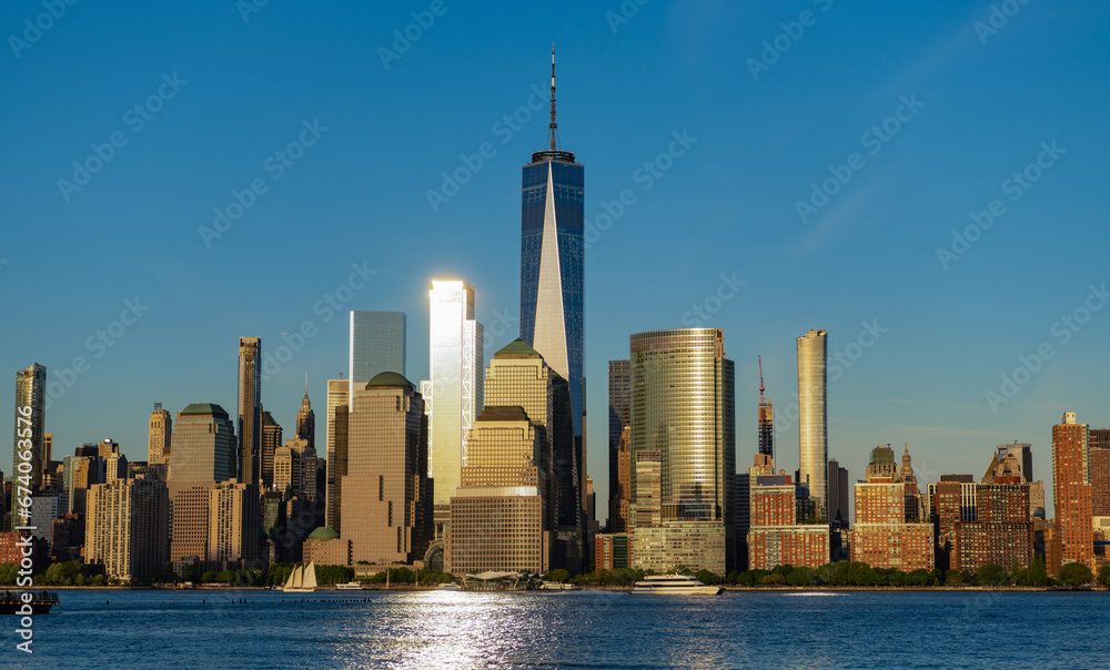 Obraz premium skyscraper building of nyc. ny urban city architecture. midtown manhattan and hudson river. metropolitan city cityscape. new york downtown. manhattan skyline in sunset. new york city. america