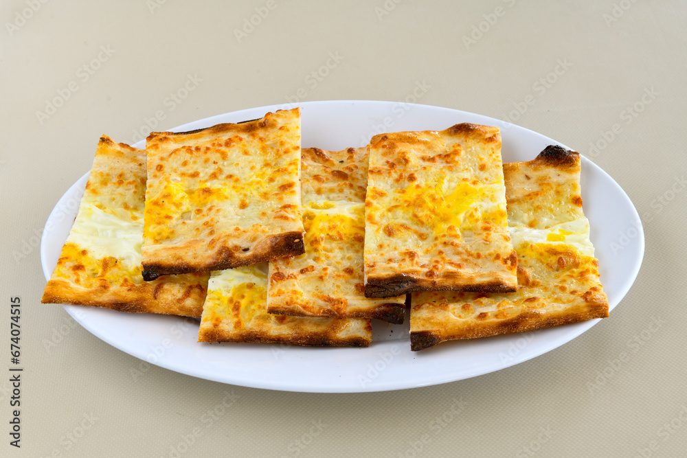 Kiymali pide.Turkish pide with minced meat. Turkish pizza mince pita Pide on white background. Etli ekmek. Kusbasi kasarli, kiymali kasarli, kiymali yumurtali,  tirnak Trabzon, Bafra, Kusbasili pide.