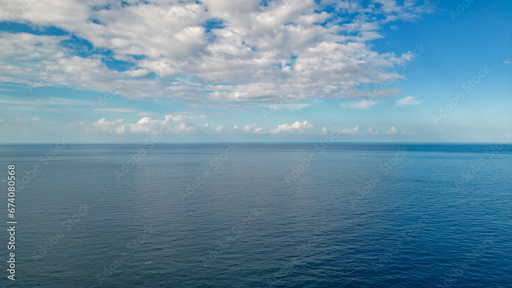 Obraz premium Drone photos off the the Big Island, Hawaii along the coast line with a beautiful blue sky and water